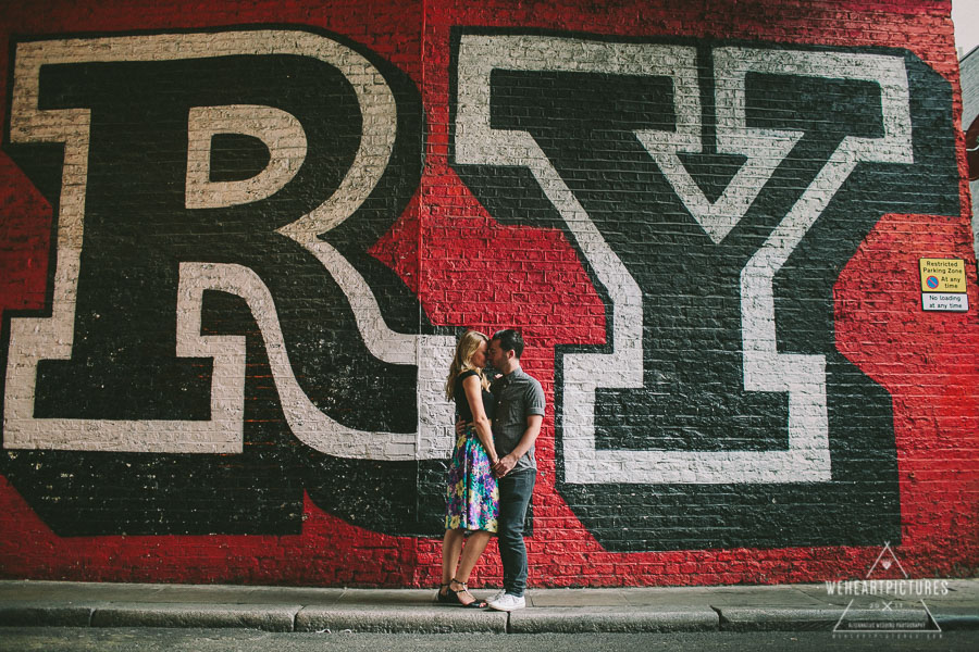London Shoreditch Engagement Session, Street Art, London, Couple in Love on a photoshoot, Creative and quirky Wedding Photography, Scary, Letters, Typo