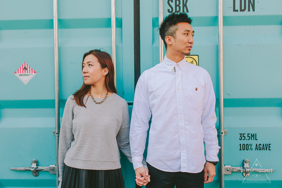 Couple standing in front of a cargo Shipment container, Alternative wedding photographer in London