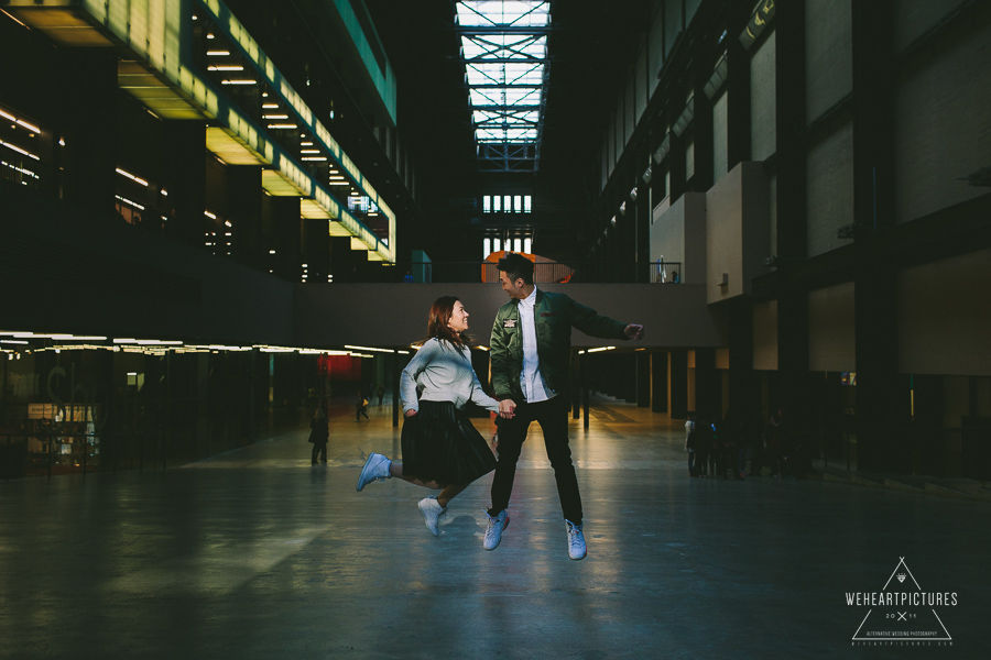 Couple Jumping in the Tate Modern, Alternative wedding photographer in London