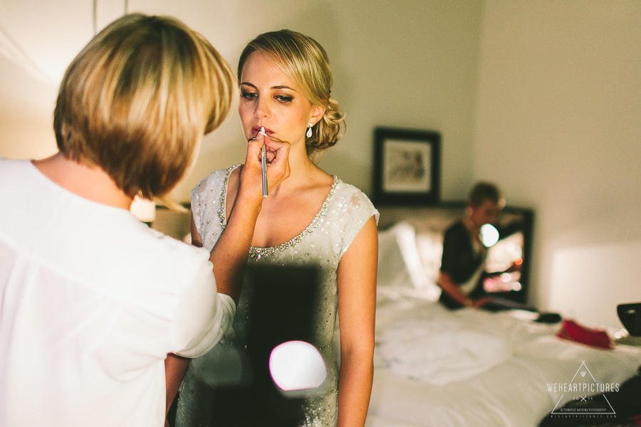 Beautiful Bride putting lipstick at a winter wedding, Preps at the Rosewood Hotel