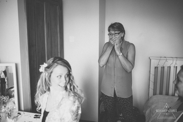 A very surprised mum by her bride daughter | London Alternative Wedding Photography UK & Destination >> weheartpictures.com