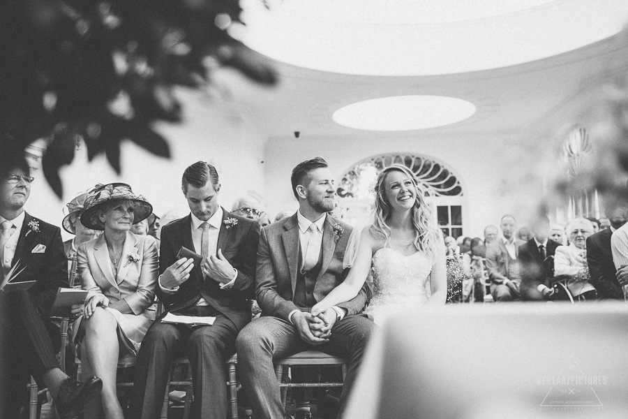 Groom mesmerised by his bride at a wedding in the Orangery | London Alternative Wedding Photography UK & Destination srcset=