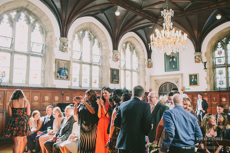 Guests taking pictures at register signing, Creative Wedding Photographer in London,  Museum-of-the-order-of-Saint-John-Wedding-Photographer