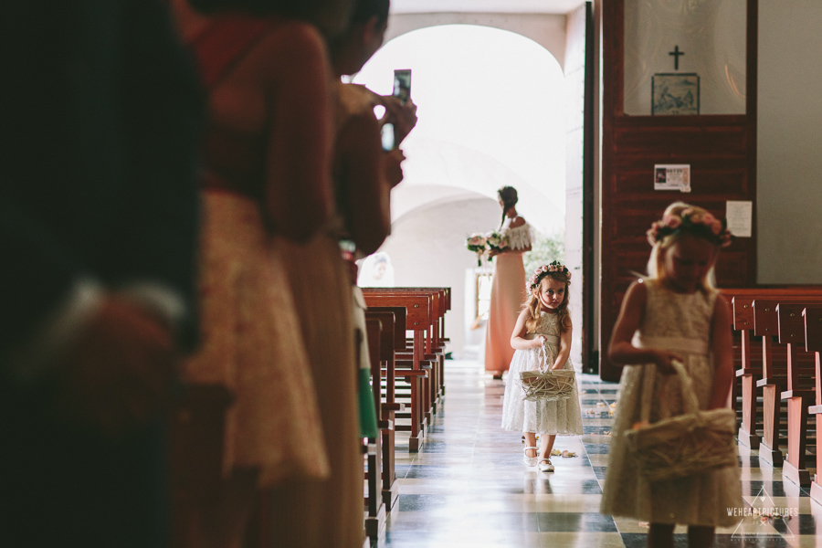 Flower girls_Church Entrance_Here comes the bride sign_Destination Wedding Photographer_London_Europe