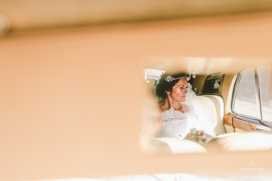 Bride in car_Bridal Portraits_Wedding at Santa Eulalia Church in Ibiza_Destination Wedding Photographer_London_Europe