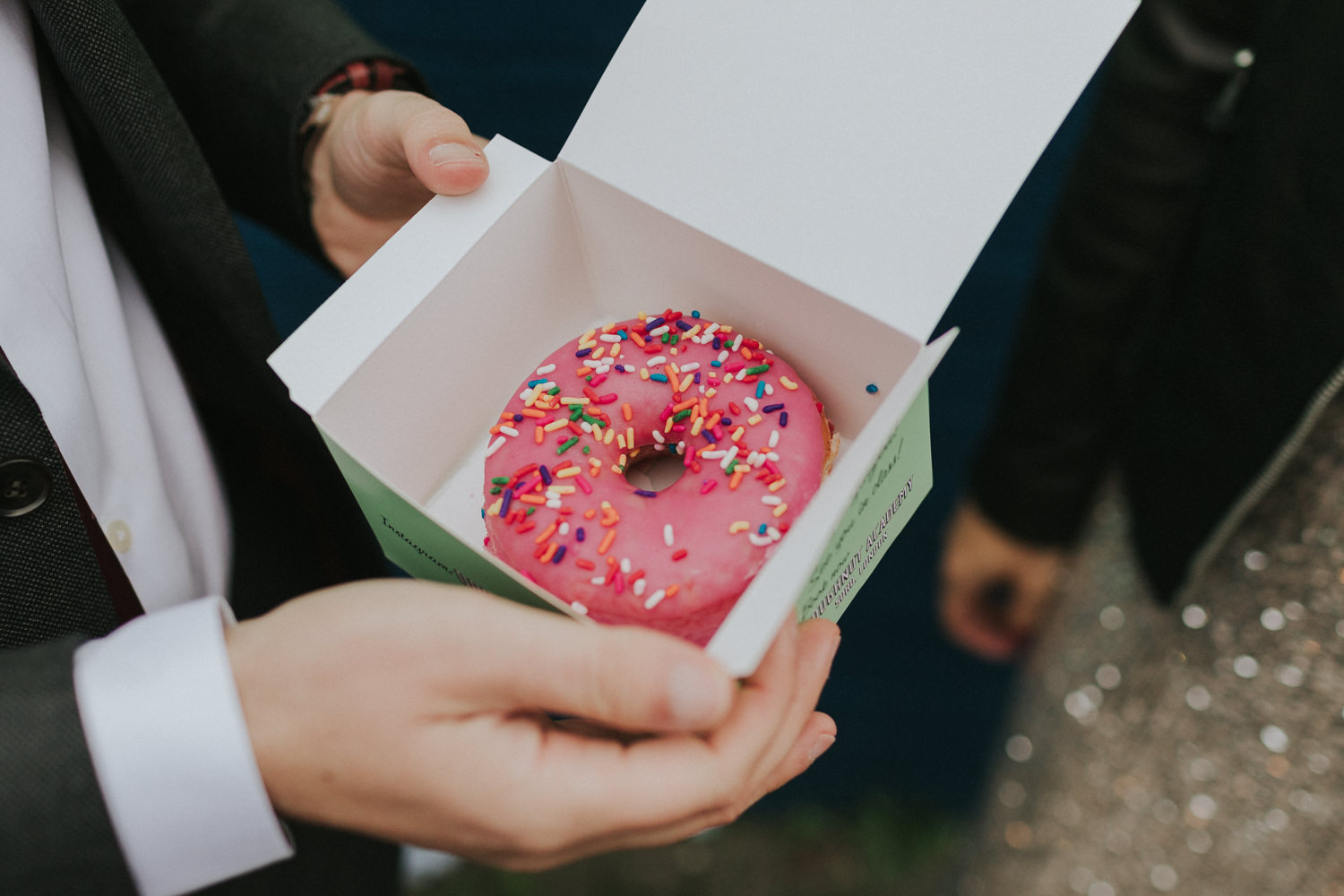 A doughnut inside a box.