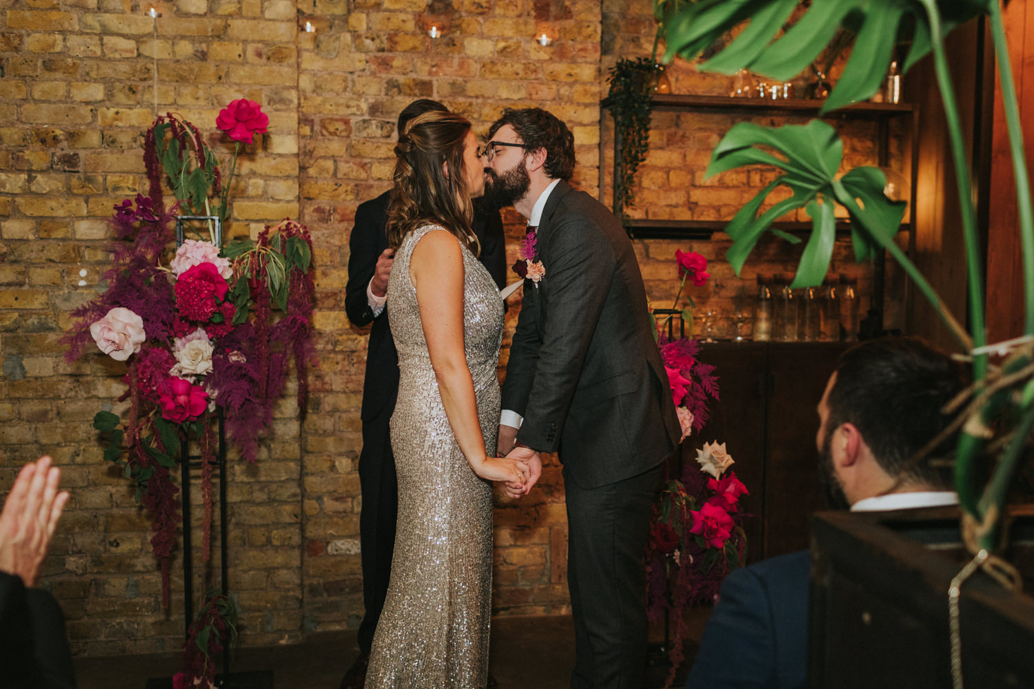 First Kiss at wedding ceremony at Hackney Coffee Company in London.