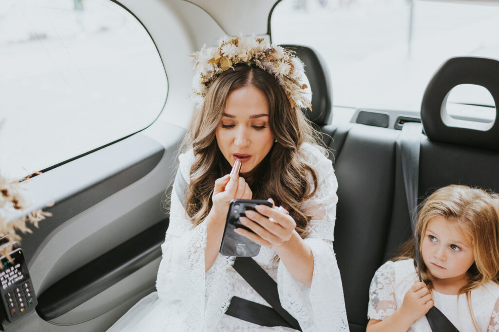 Bride on taxi ride to get married - AMP Studios - Asylum Chapel London Alternative Wedding Photographer- We Heart Pictures