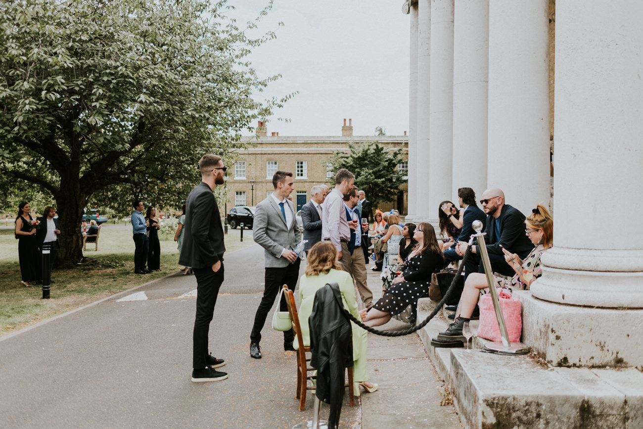 Relaxed guests at London Wedding Ceremony at Asylum Chapel in Caroline Gardens - Alternative Wedding Photography We Heart Pictures 