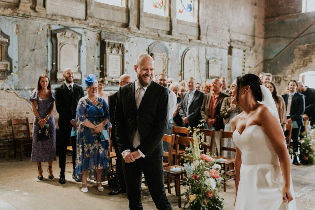 Bride and Groom first look - London Wedding Ceremony at Asylum Chapel in Caroline Gardens - Alternative Wedding Photography We Heart Pictures