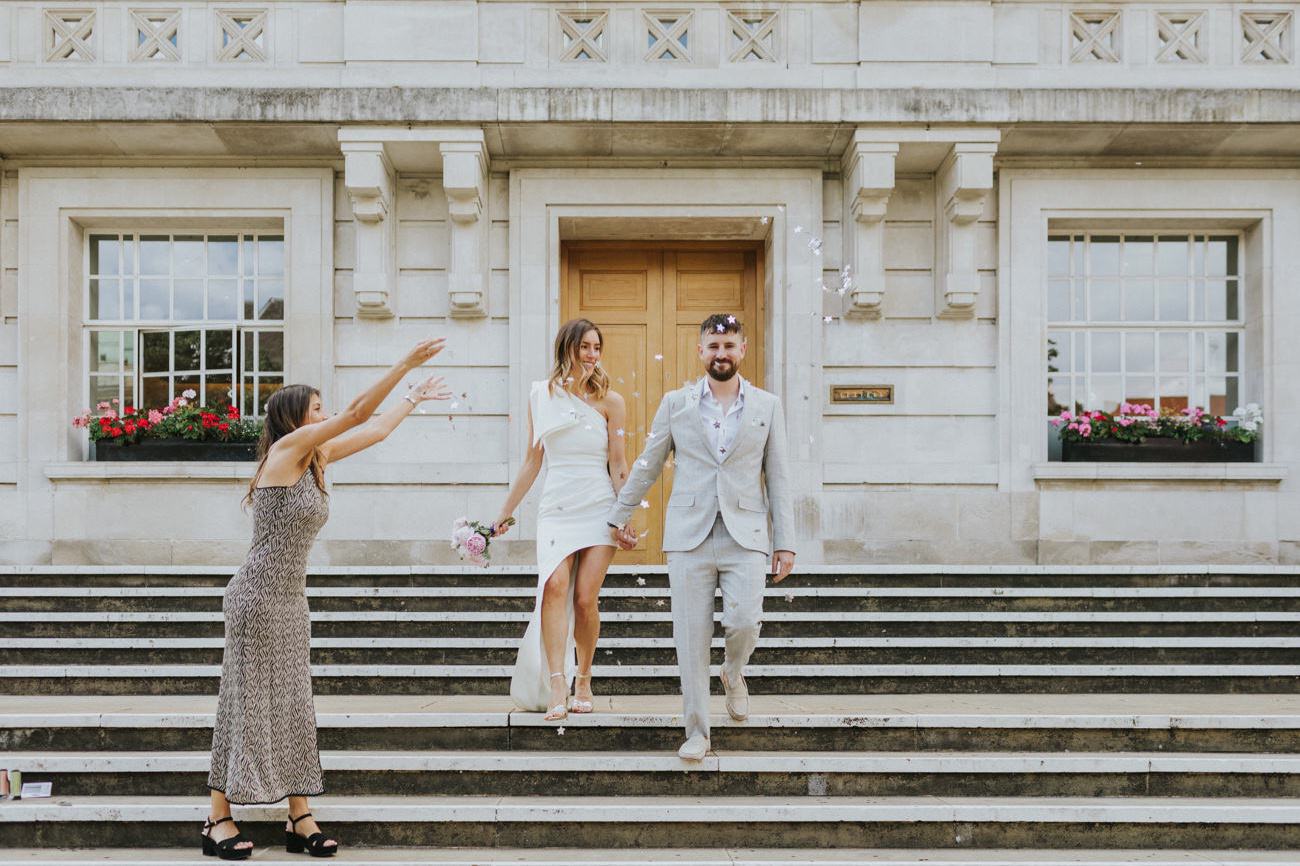 Confetti shoot for bride and groom after their Elopement ceremony at Hackney Town Hall.